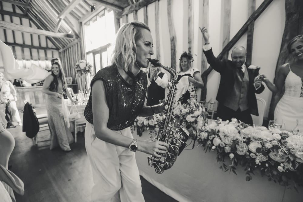 Sister Sax playing Sax ands Dancing with the Bride and wedding party on the dance floor